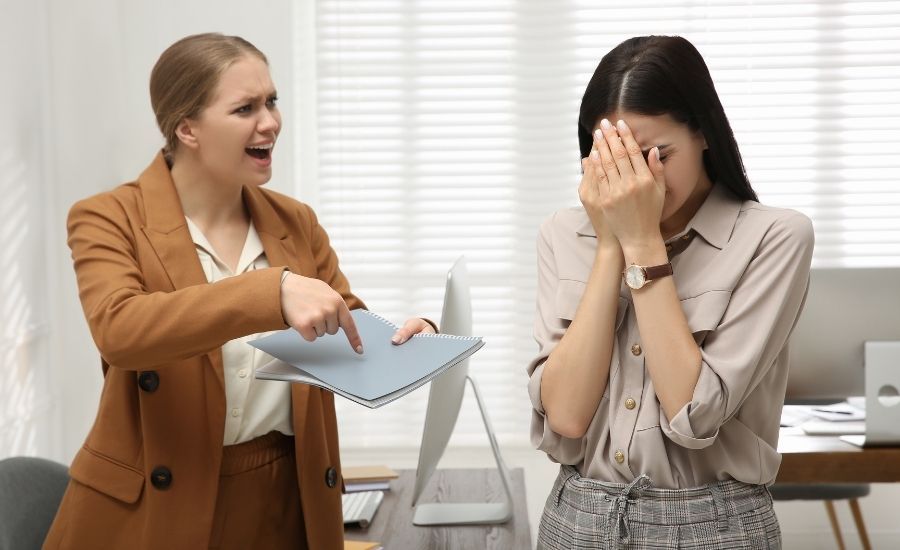 woman scolding a colleague
