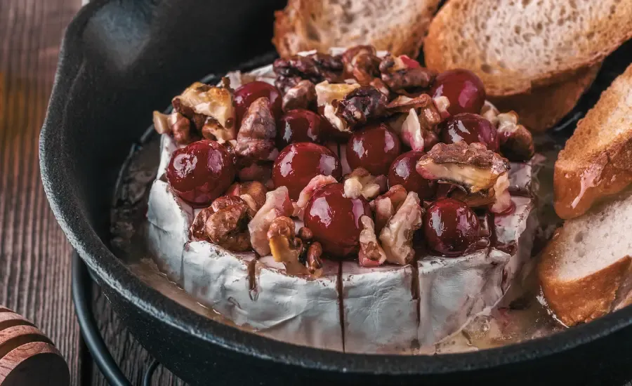 baked brie with cranberries and pecans for thanksgiving