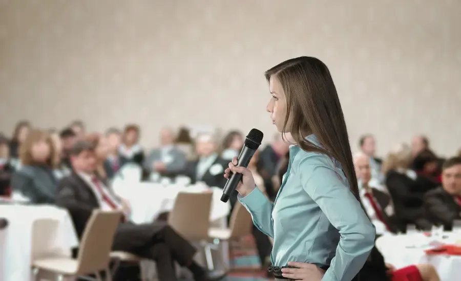 woman speaking in meeting