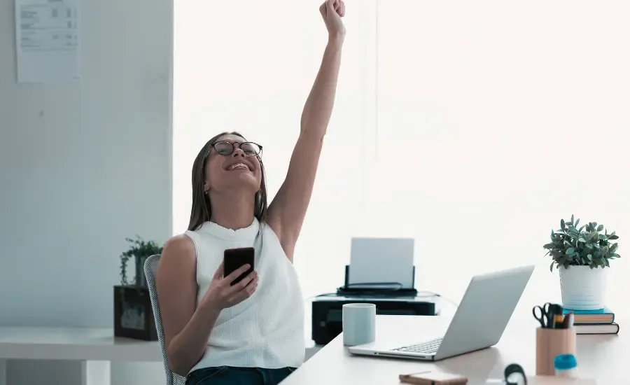 consistent woman celebrates her success