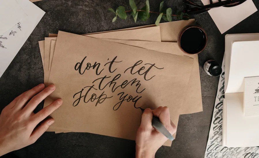 calligraphy writing don't let them stop you