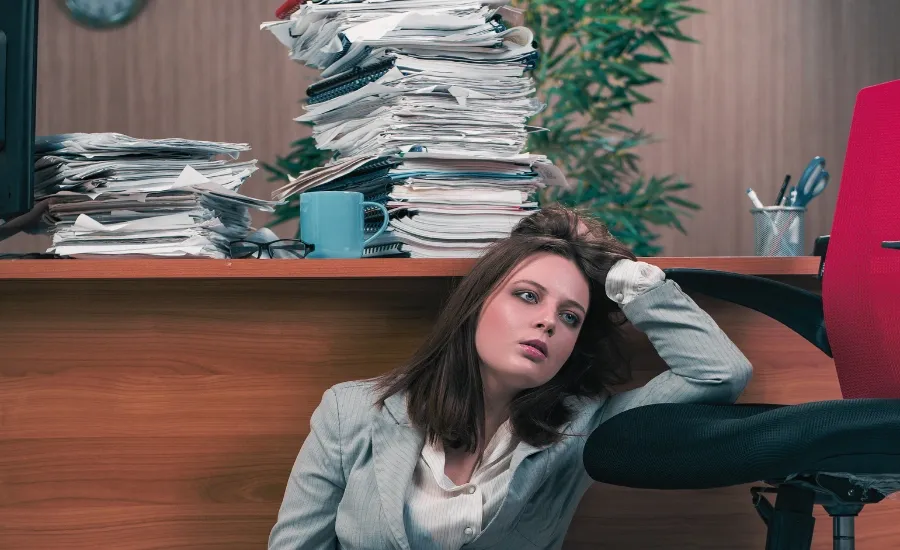 woman being overworked and underpaid